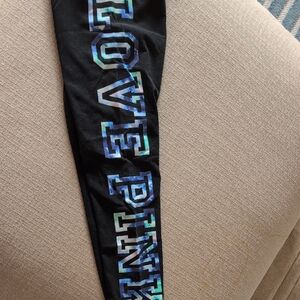 Victoria's Secret Black Leggings with Iridescent Blue-Green Logo